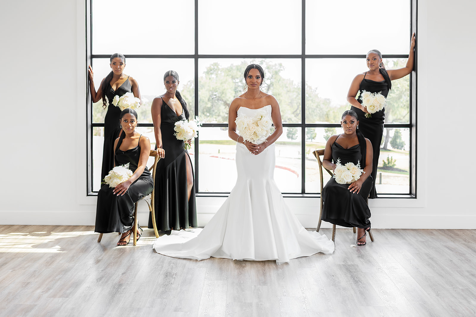 "Joyful bride and bridesmaids, showcasing the success of mastering bridesmaids duties with Hayden & Co. Events."